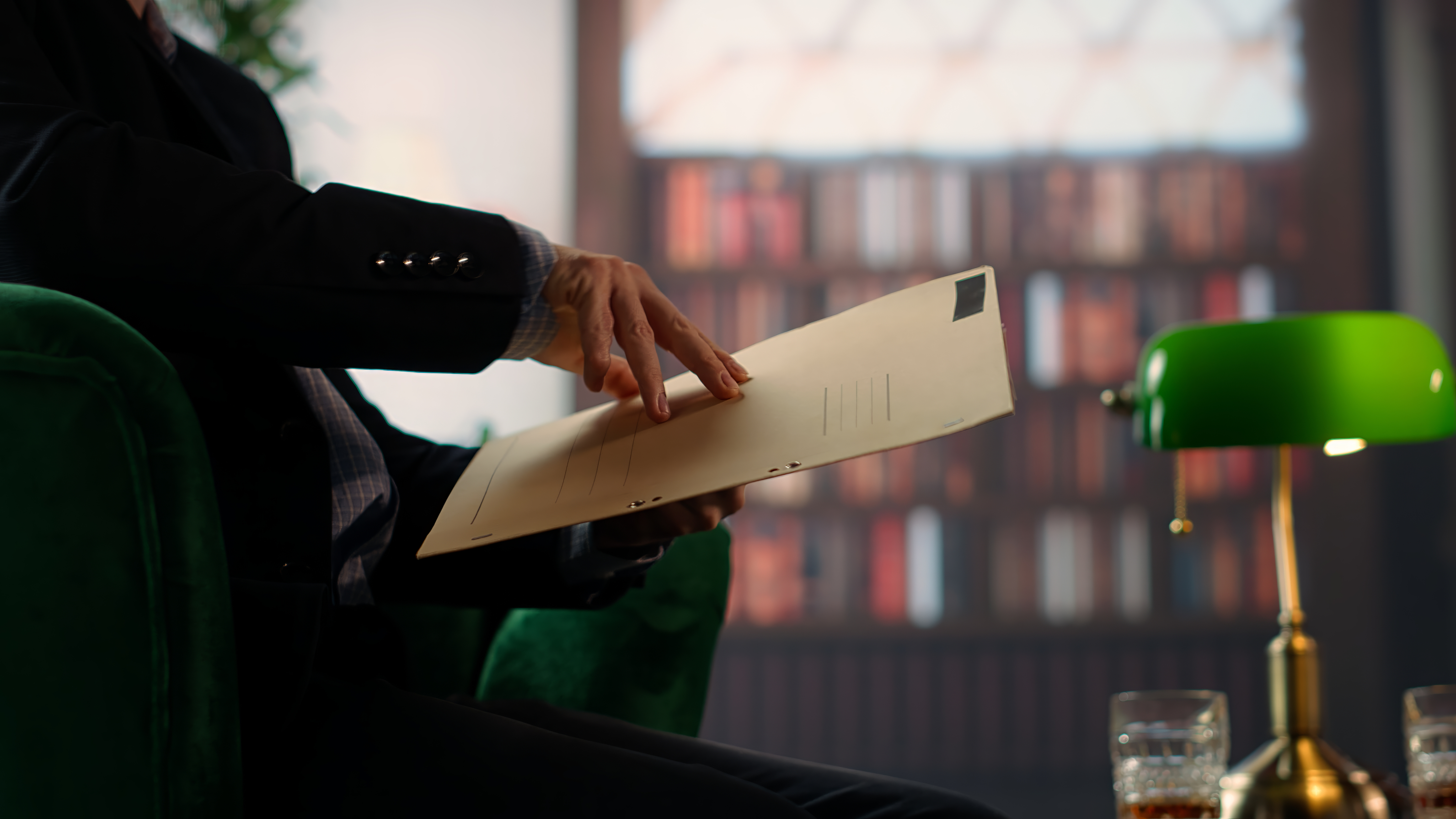 Professional holding legal papers in a library