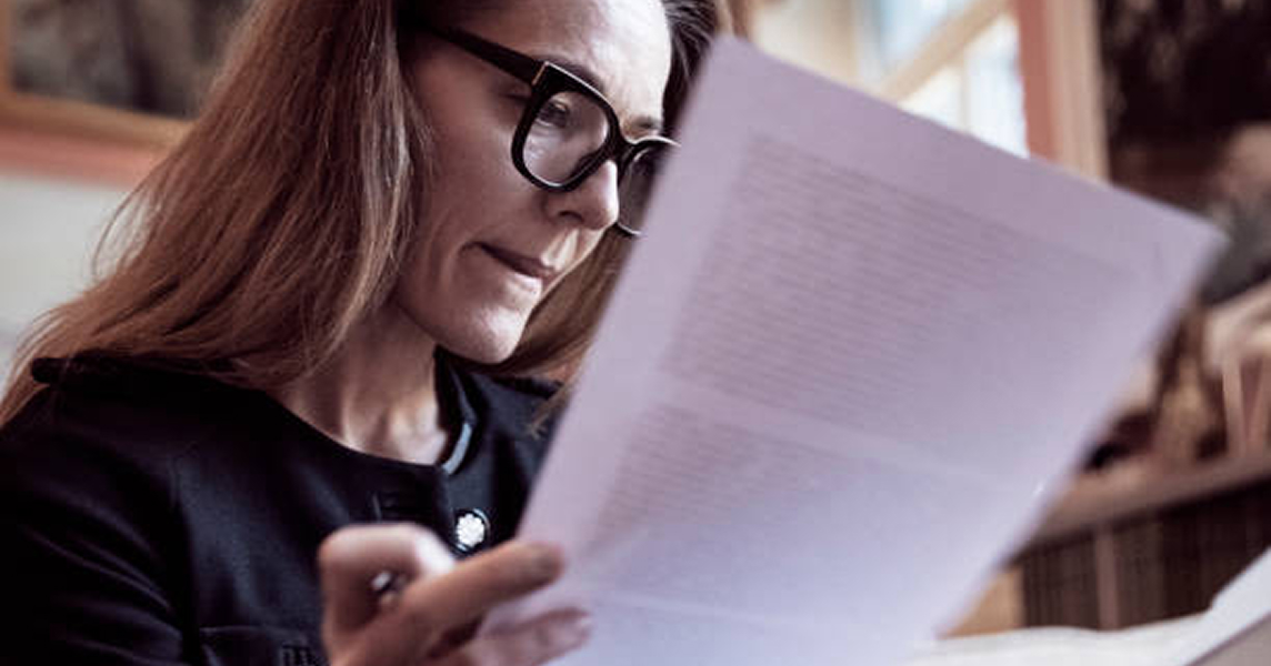 Legal professional reading a publication document